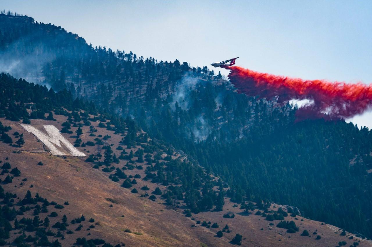 Wildfire retardant being dropped by the college "M" during the Bridger Foothills Fire, 2020.